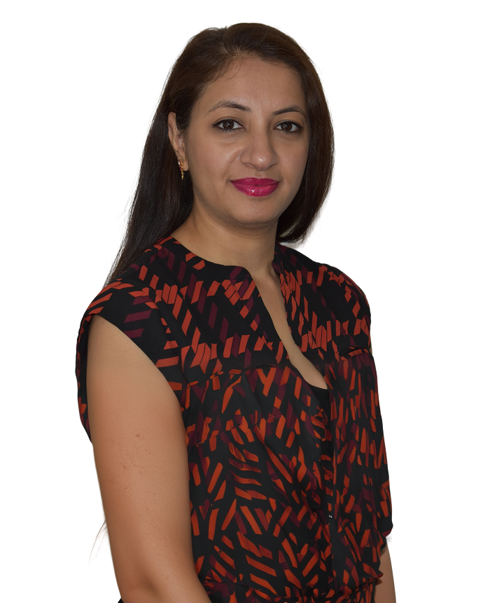 Dr. Preeti Bharadwaj smiling in a white coat.